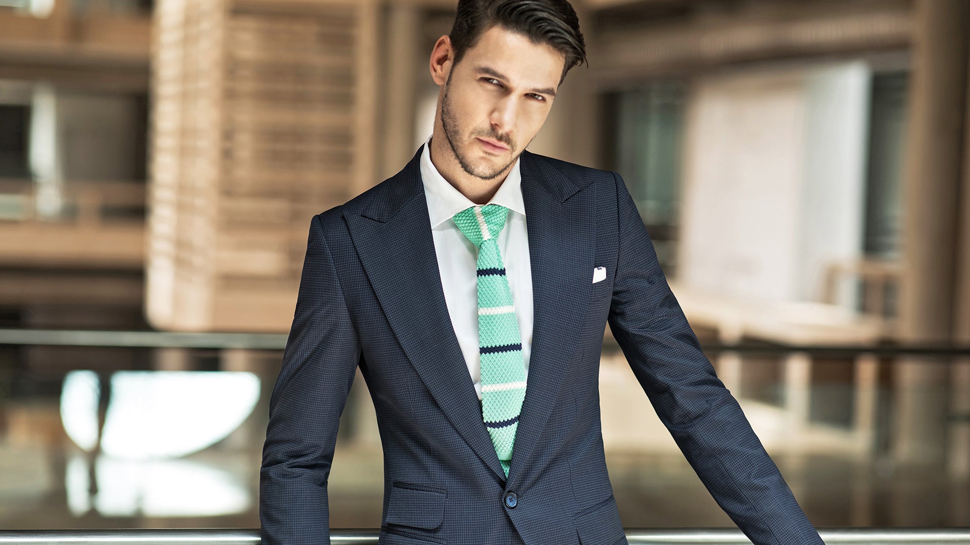 MILD TEXTURE ON THIS SUIT MAKES IT VERY IMPRESSIVE. SINGLE BREASTED FORMAL BLUISH GREY