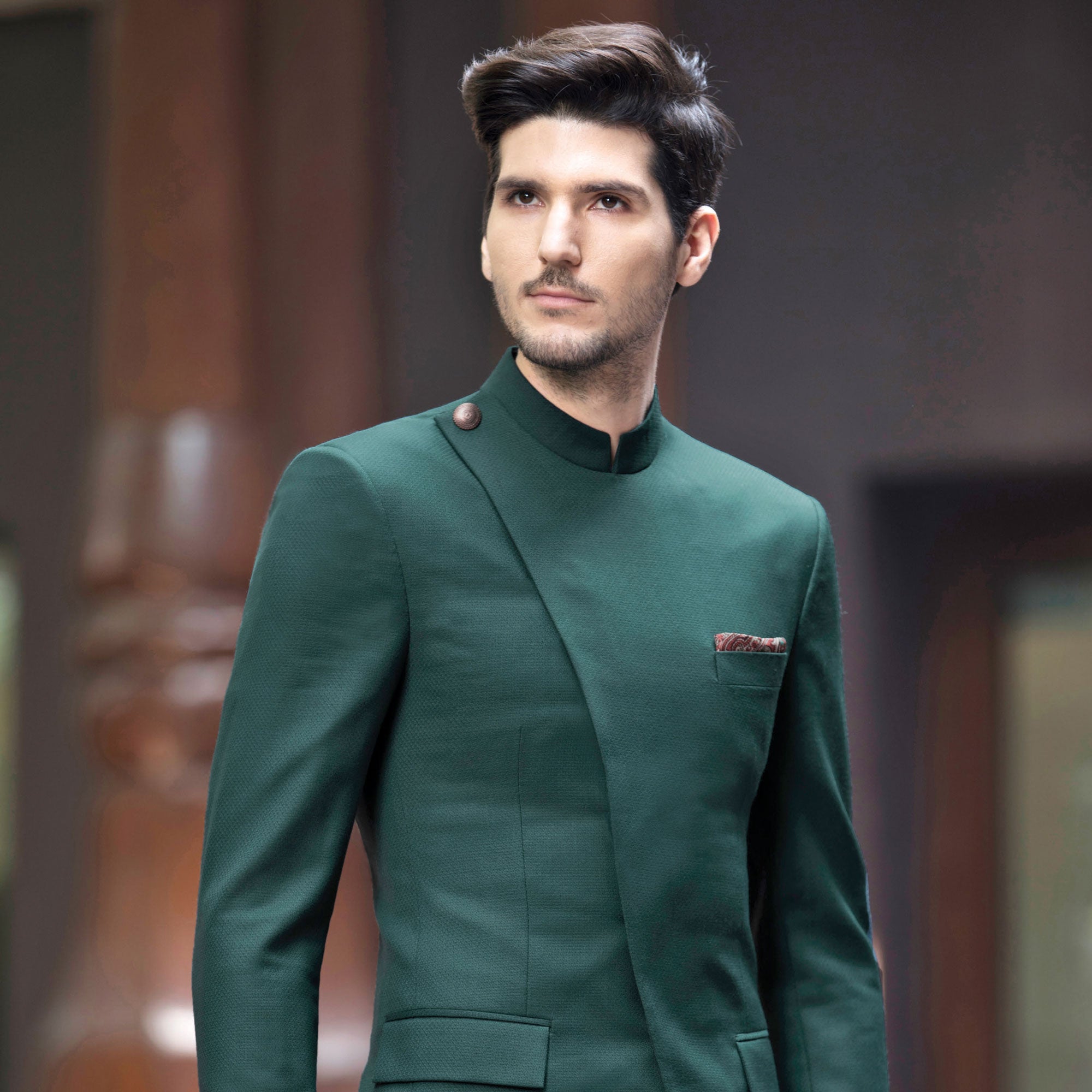 BOTTLE GREEN BANDH GALA STYLED WITH A GOLD BUTTON.