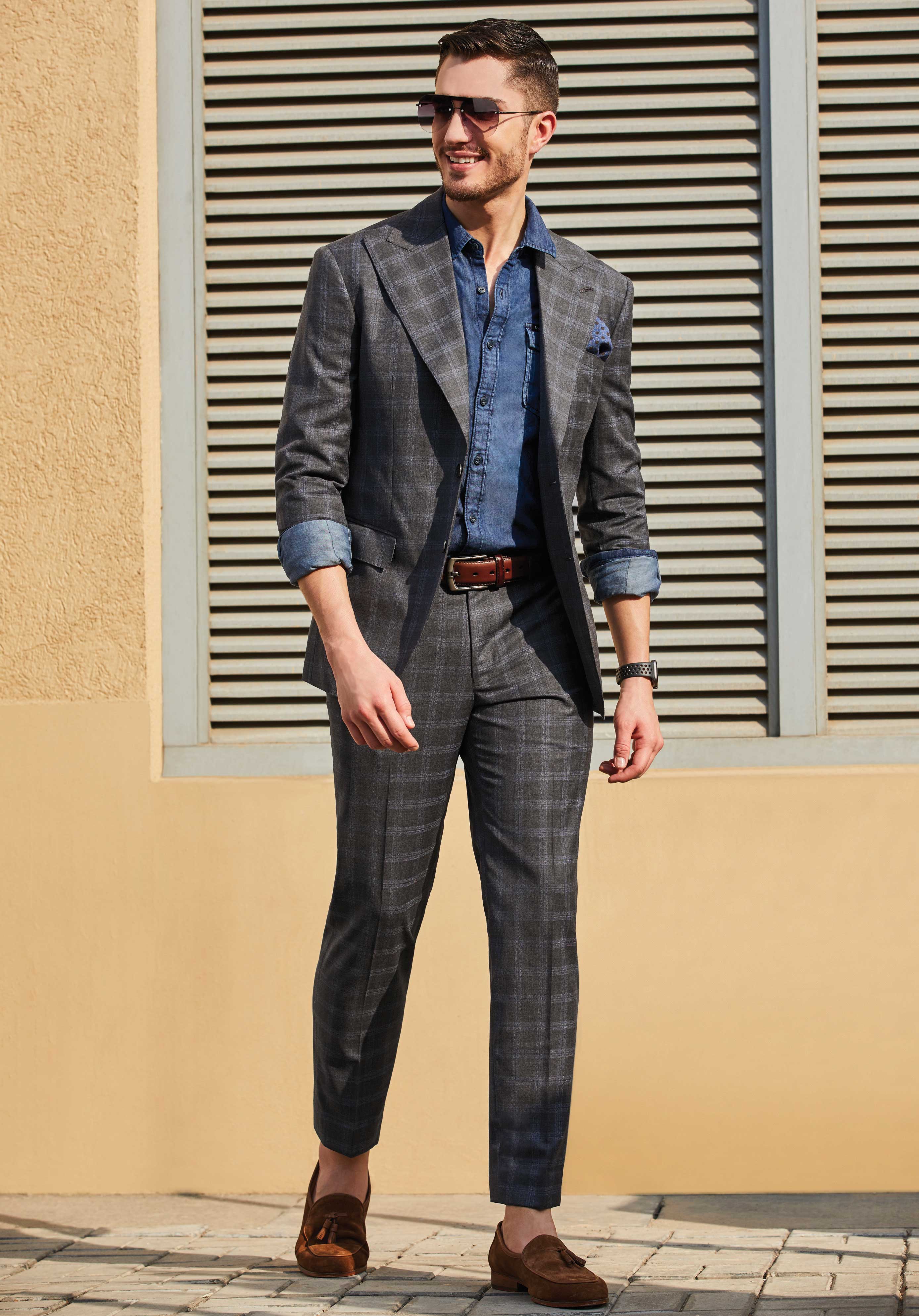 CHARCOAL GREY CHECKED COAT SINGLE BREASTED WITH BROAD LAPEL.