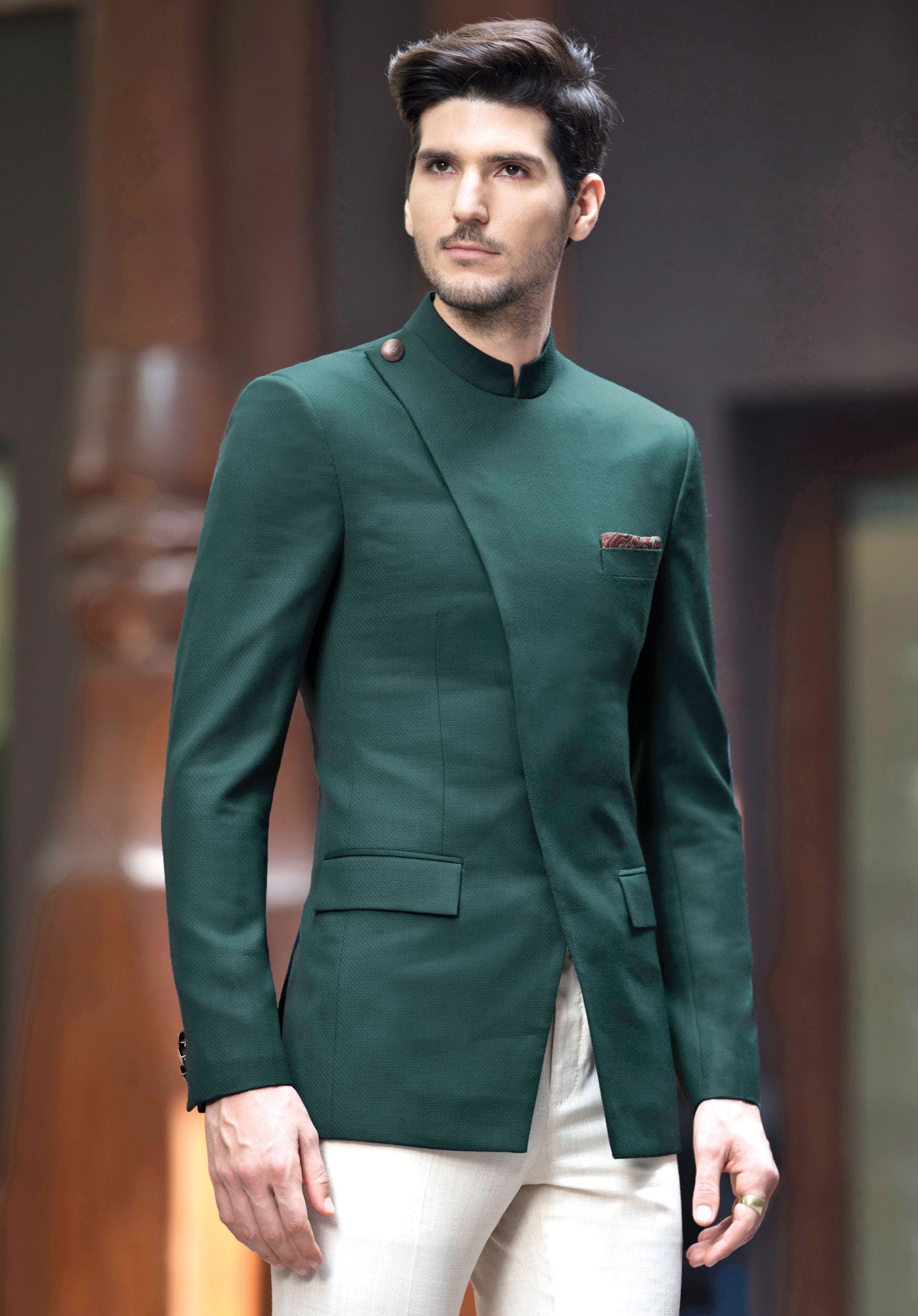 BOTTLE GREEN BANDH GALA STYLED WITH A GOLD BUTTON.