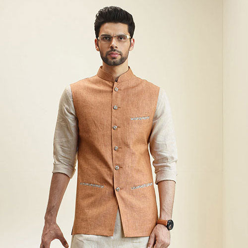 IZMIR BANDHGALA PAIRED WITH A KURTA AND A TROUSER.
