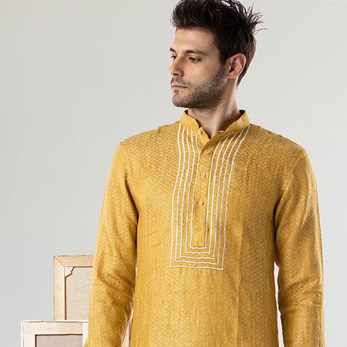CATANIA YELLOW LINEN KURTA WITH OFFWHITE PANTS.