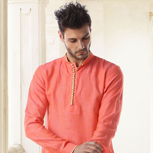 KREFELD PEACH LINEN KURTA WITH AN OFFWHITE PANT